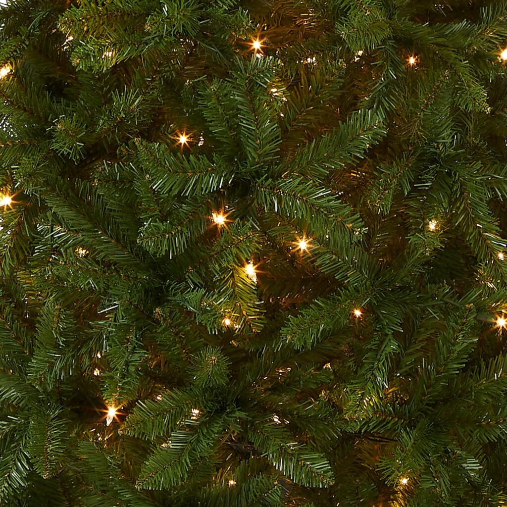 National Tree Company Artificial Pre-Lit Slim Christmas Tree, Green, Kingswood Fir, White Lights, Includes Stand, 6.5 Feet